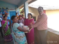 Distribution of foodgrain at Antharvaredi Neral
